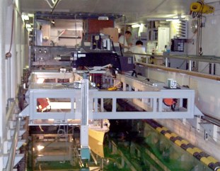 Photo showing model 5512, phase-tracking servo-type wave gage in the foreground, and the 2DPIV system in the background.